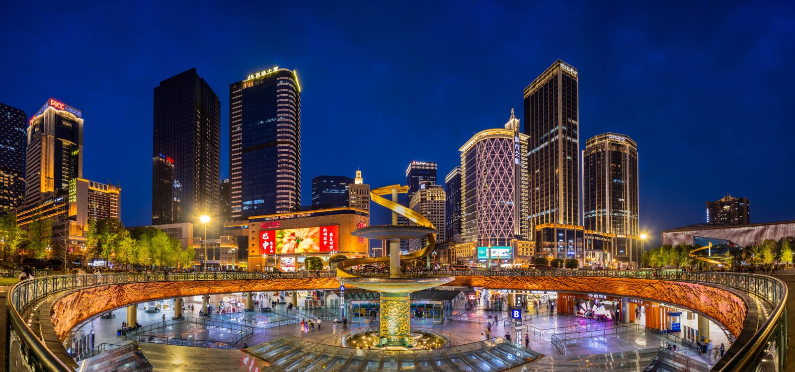 A city skyline photographed at civil twilight blue hour